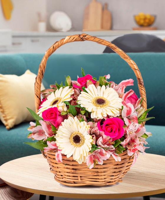 Cesta con Flores de Temporada Cesta de flores rosadas para regalar